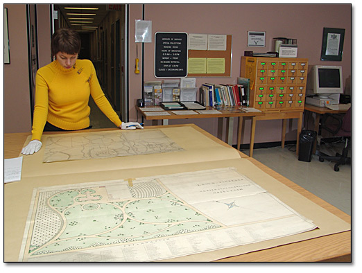 Photo: Researcher examines a landscape drawing