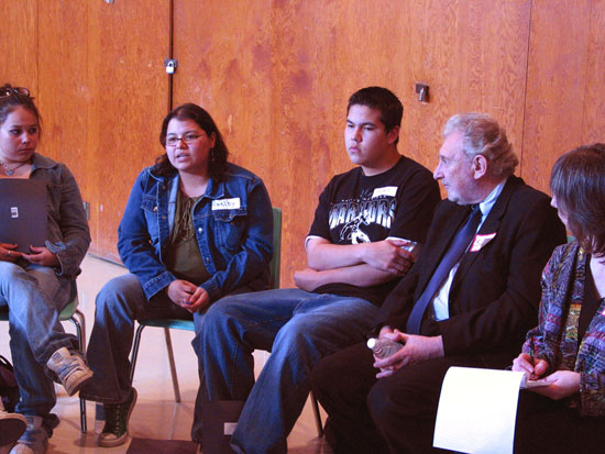 Mr. Justice Sidney Linden, Ipperwash Inquiry Commissioner (second from right), listens during a small group discussion.