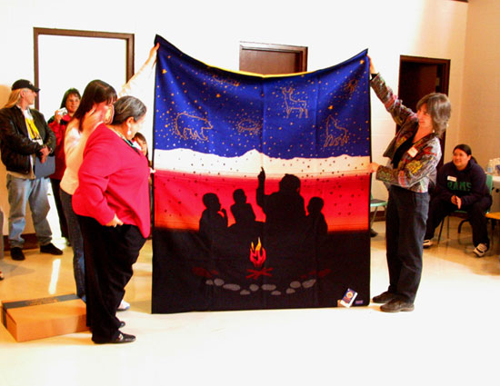 Presentation of the Pendleton blanket, named The Storyteller - Keep My Fires Burning to Justice of the Peace Donna Phillips.