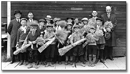 Photo: Championship school fair boys with grain, [ca. 1920]