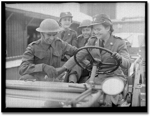 Photo: Military personnel in an army vehicle, [vers 1945]