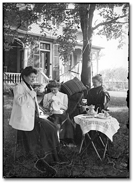 Photo: Three ladies taking tea outside, [between 1898 and 1920]