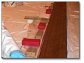 Photo: Conservator Attaching Balsa Strips to Panorama Frame