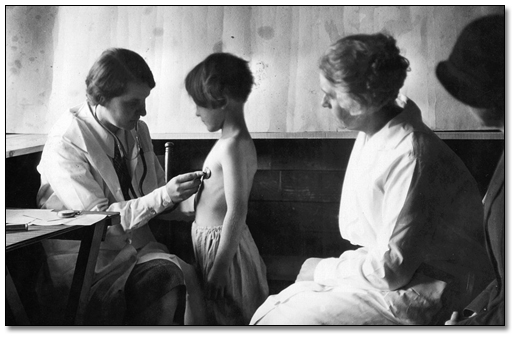 Photo: Child receiving a medical examination, 1929