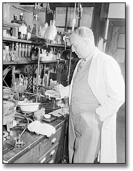 Photo: Dr. Charles Best working in a lab, May 20, 1948