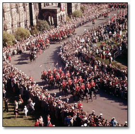Photo: RCMP procession approaching Parliament Hill Parliament Buildings, Ottawa