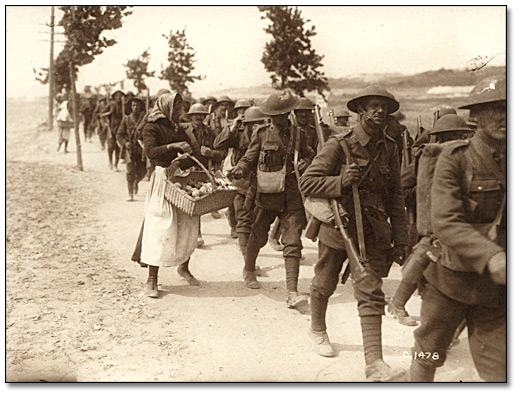 Photo: French women selling oranges to Canadian troops on their return to camp, [ca. 1918]
