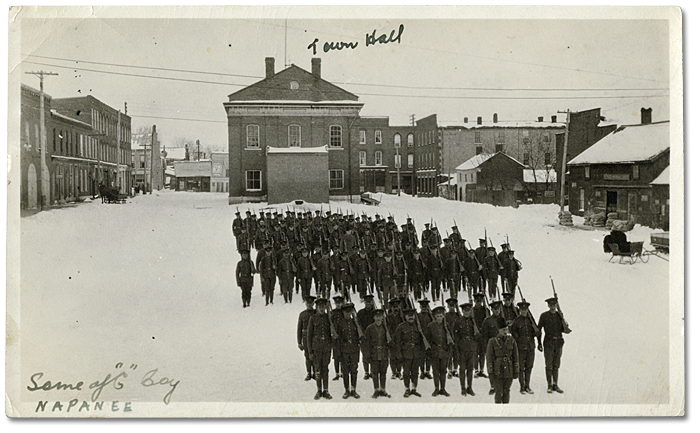 Soldiers of the “C” Company, 80th Overseas Battalion, Canadian Expeditionary Force (C.E.F.) training in front of the town hall in Napanee, Ontario, [ca. 1914-1917]
