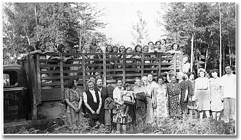 Photo: Group of campers, counsellors, and leaders ready to go home at the end of the Women's Christian Temperance Union's Y.T.C. girls' camp, 1947