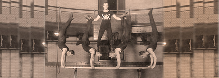 Gymnasts posing on parallel bars, [ca. 1910] 