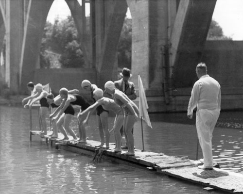 Junior Women's Section of Beehive Swim. Gus Ryder, in white, is director of the swim, 1937