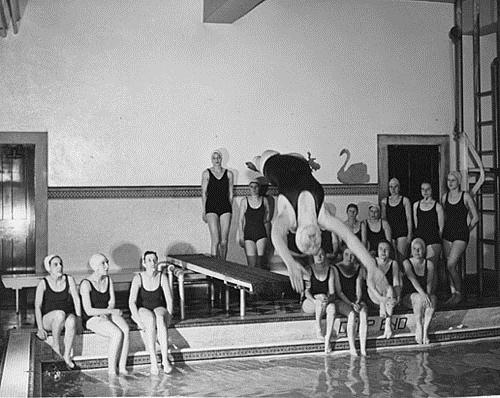 Woman diving, Toronto, [ca. 1950-1970]