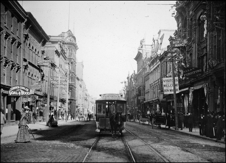 View showing a horse streetcar on King Street, just east of Yonge Street, Toronto, 1885