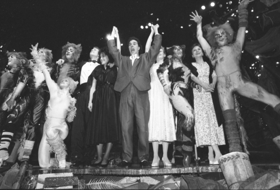 Eleven performers on stage taking bows for the last performance of the musical CATS at Elgin Theatre, Toronto, 1987. 