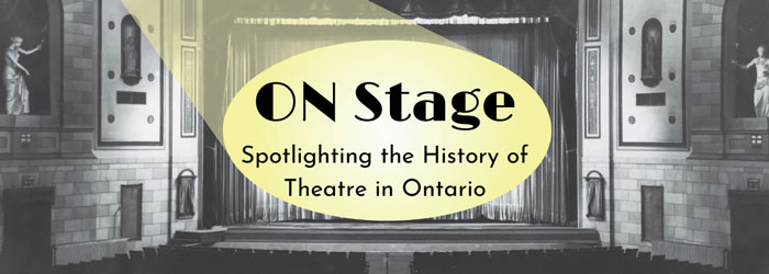 Exhibit title in a yellow spotlight over a black and white photo of a stage
