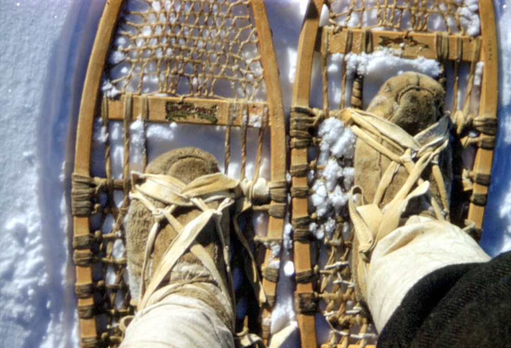 John Macfie's feet, harnessed to snowshoes in the Ojibway/Cree fashion