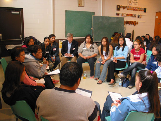  Derry Millar (centre), lead Commission Counsel, listens during a small group discussion.