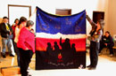 Presentation of the Pendleton blanket, named The Storyteller - Keep My Fires Burning to Justice of the Peace Donna Phillips.