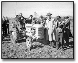 Photo: Inspecting machinery at the International Ploughing Match, 1941