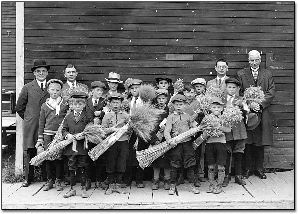 Photo: Championship school fair boys with grain, [ca. 1920]