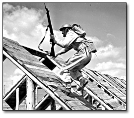 Photo: Soldier running a ramp during training exercise, [ca. 1945]