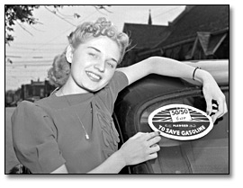 Photo: Woman with 50/50 Car – gasoline pledge, 1941