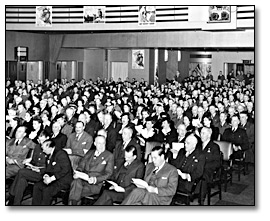 Photo: Eaton’s employees in auditorium at a War Bond Rally, 1943