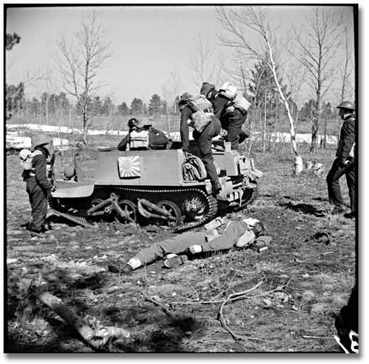 Photo: Soldiers doing exercises with a tank during commando training, Camp Borden, 1941