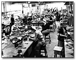 Photo: Women soldering and assembling cables for airplanes, Canadian Car and Foundry Co., 1945