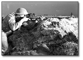 Photo: Soldiers during training Sniping school at Camp Borden [guy with rifle], May 1941