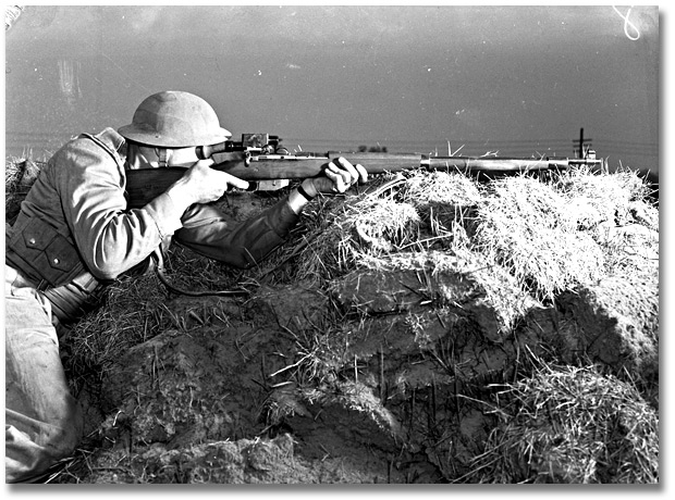 Photo: Soldiers during training Sniping school at Camp Borden [guy with rifle], May 1941