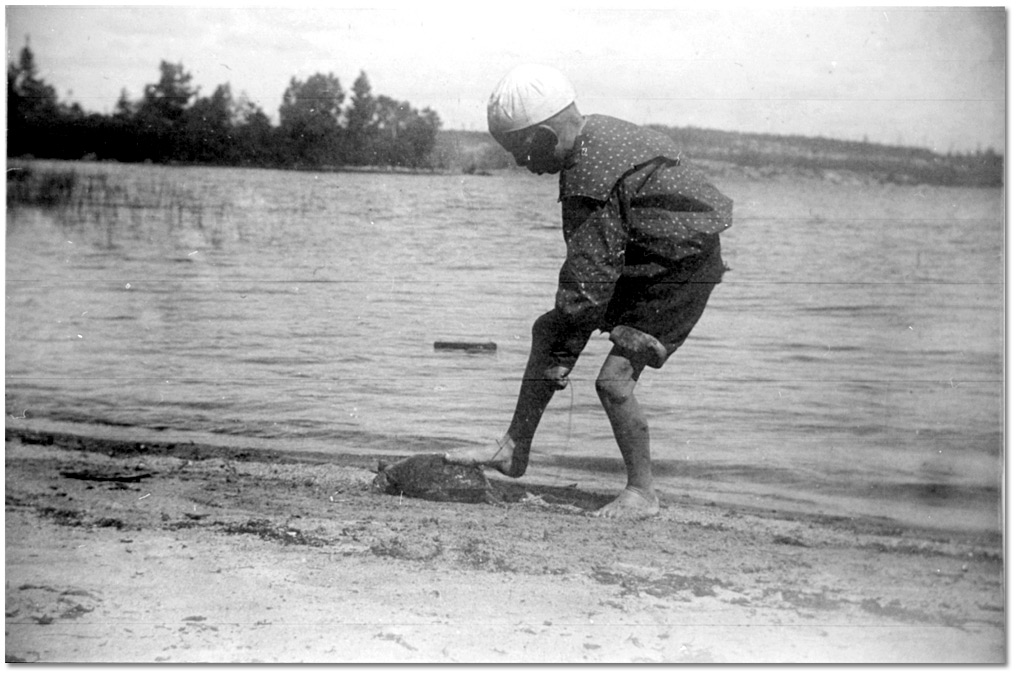 Playful scene of a boy training a turtle, [between 1875 and 1900]