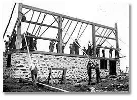 Photo: Men raising a barn, [ca. 1905]