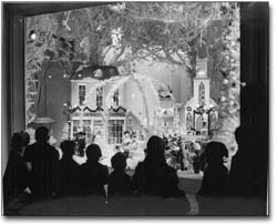 Photo: Children looking at a Christmas window display, 1958