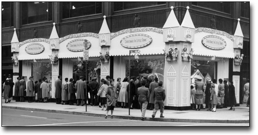 Photo: People looking at window display, 1958