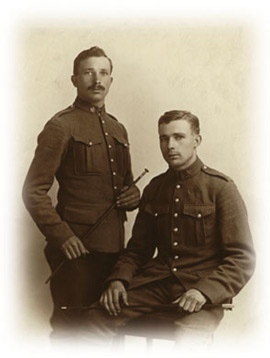 Studio Photograph of Charles and Walter Gray  posing in their uniforms prior to shipping overseas to fight in World War I