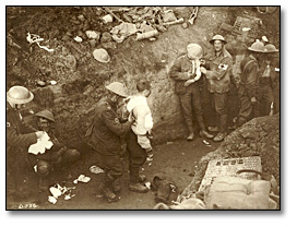 Photo: Canadian troops dressing wounded in a trench, [ca. 1918]