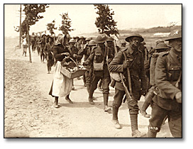 Photo: French women selling oranges to Canadian toops on their return to camp, [ca. 1918]