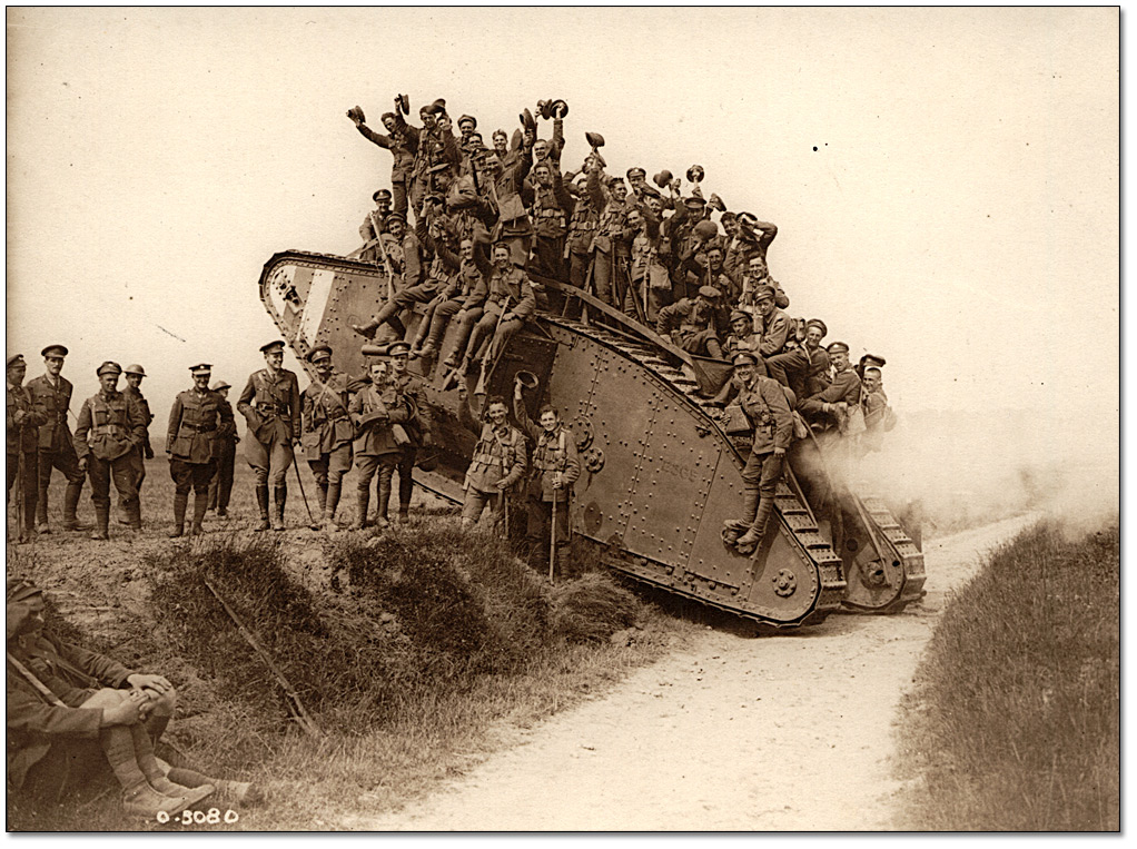 Photo: Canadians are seen returning on a tank, 5th Canadian Mounted Regiment