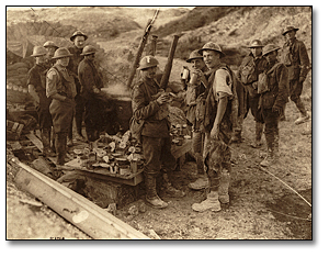 A Canadian soldier badly wounded in his shoulder  and leg drinking hot coffee at a soup kitchen  100 yards from the German lines at Hill 70, [ca. 1918]