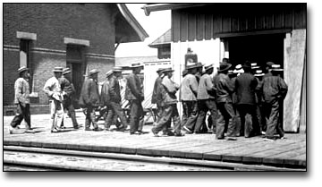 Photograph: Chinese immigrants entering Canada at the Sarnia tunnel, [189?]