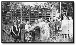 Photo: Group of campers, counsellors, and leaders ready to go home at the end of the Women's Christian Temperance Union's Y.T.C. girls' camp, 1947