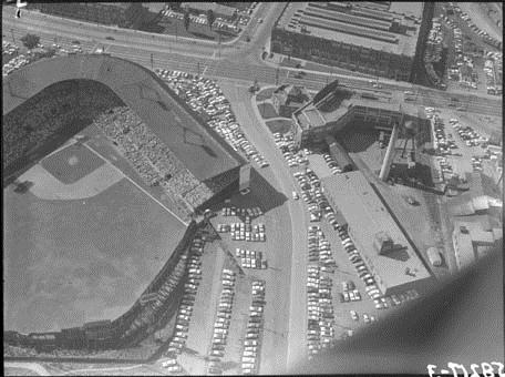 Aerial view, looking north, of a baseball game in progress at Maple Leaf Stadium, Front and Bathurst Streets, Toronto, 1958