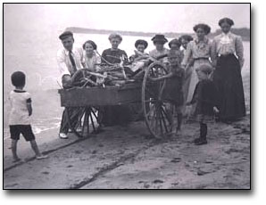 Family with Wagon on the Beach