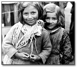 Photograph of two young Spanish girls looking to the camera