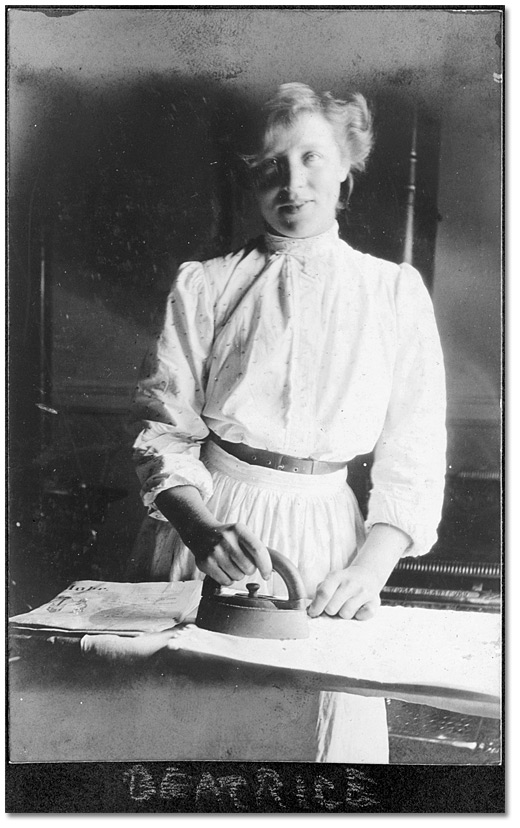 Photo: Domestic servant, Beatrice, ironing, 1906