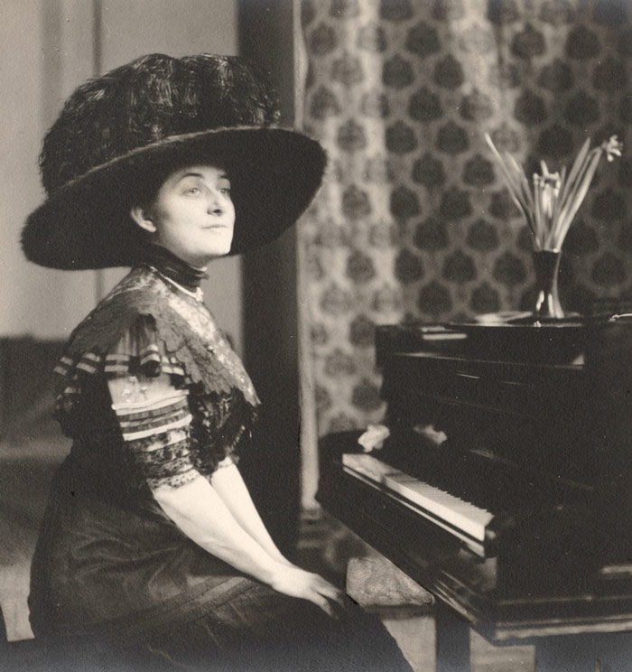 Mrs. Barton at the Arts and Letters Club piano, Toronto
